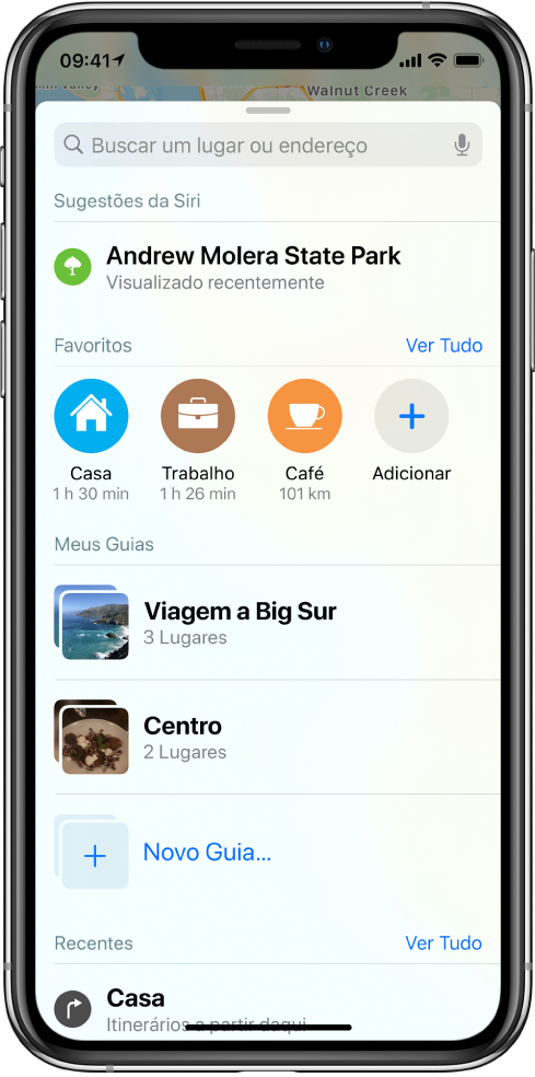 O cartão de busca preenche a tela. A seção Meus Guias aparece abaixo da fileira Favoritos. Na seção Meus Guias, os guias “Viagem de Big Sur” e “Centro da Cidade”, além de uma opção para criar um novo guia.
