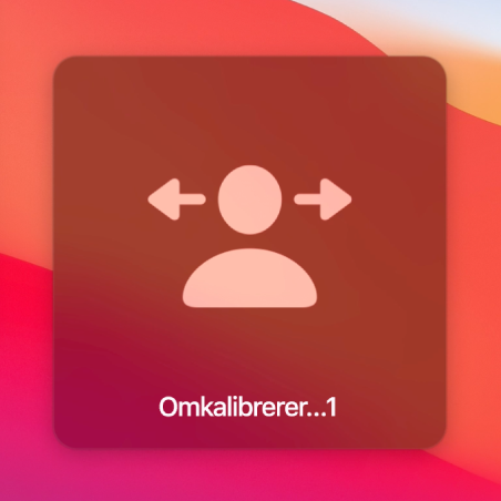 Nedtællingen på skærmen før omkalibrering af hovedmarkøren, der viser “Omkalibrerer…1”.