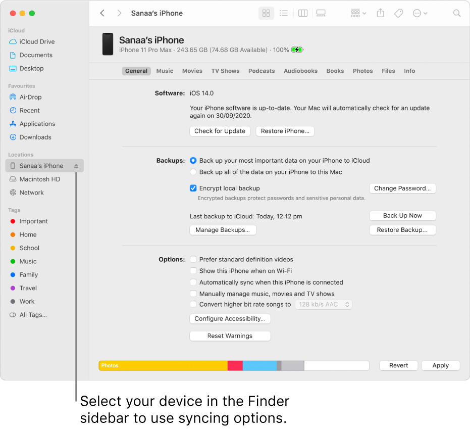 A device selected in the Finder sidebar and syncing options appearing in the window.
