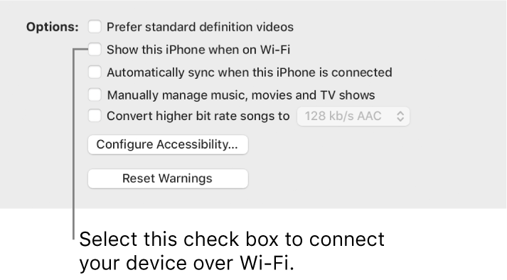 The sync options showing tick boxes to manually manage content items with the “Show this [device] when on Wi-Fi” tick box identified.