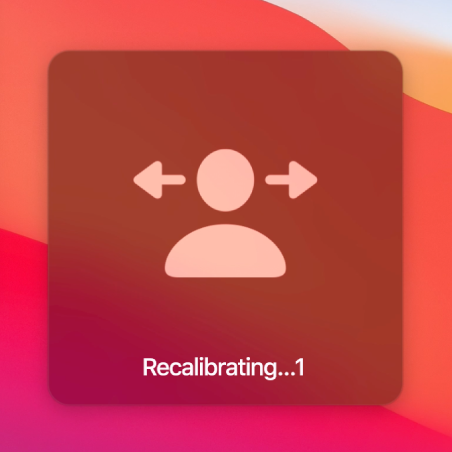 The onscreen countdown for head pointer recalibration, showing “Recalibrating…1”.