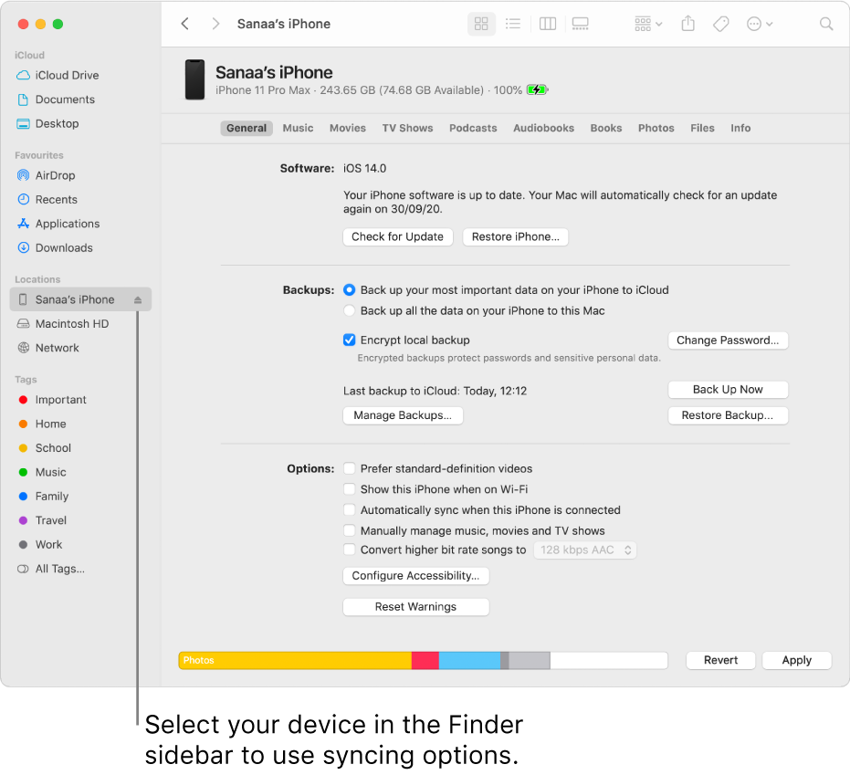 A device selected in the Finder sidebar and syncing options appearing in the window.