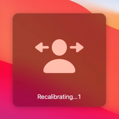 The onscreen countdown for head pointer recalibration, showing “Recalibrating…1.”