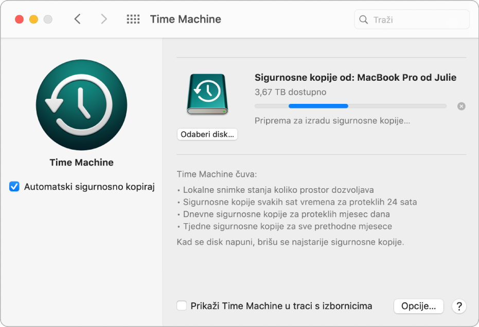Time Machine postavke s prikazom statusa napretka izrade sigurnosne kopije na vanjski disk.