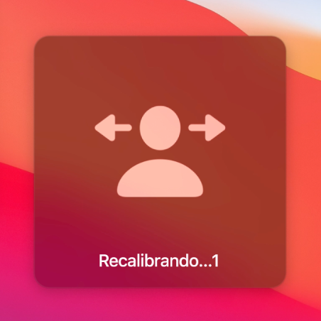 A contagem regressiva na tela para a recalibração do cursor de cabeça, mostrando “Recalibrando…1.”