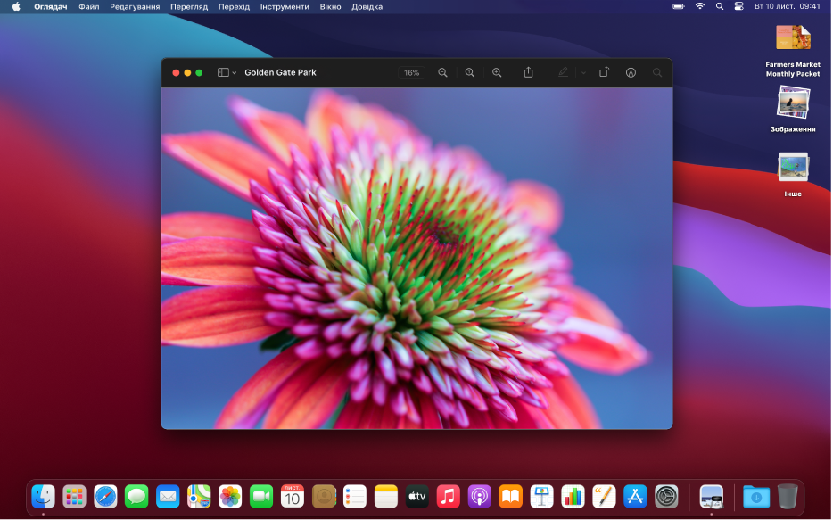 Робочий стіл Mac у темному режимі, на якому відображається вікно відкритої програми, панель Dock і смуга меню.