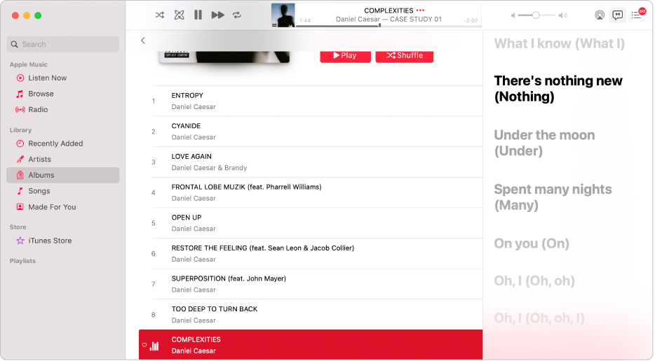 A song playing with lyrics on the right, which appear on-screen in time with the music.