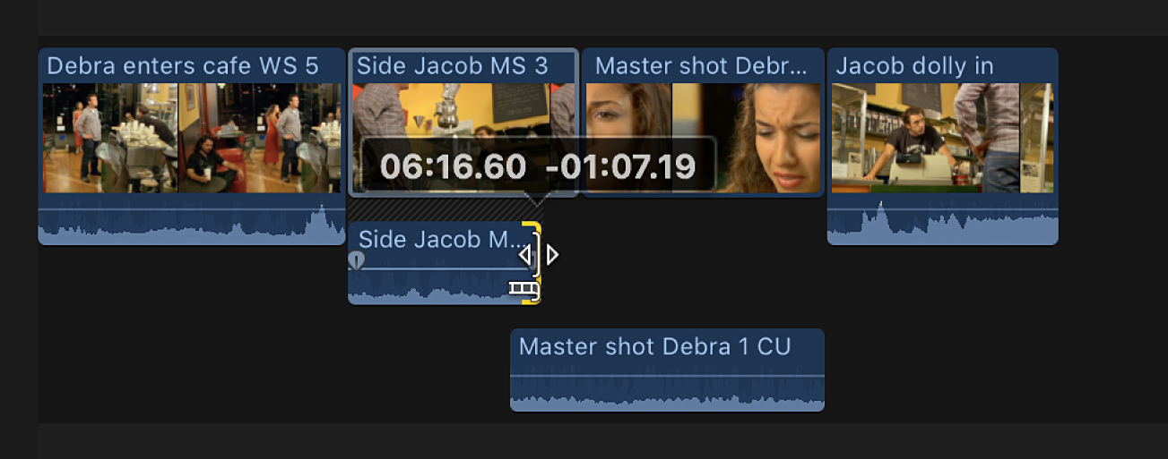 The preceding clip’s audio end point being dragged back so that the audio no longer overlaps in the timeline