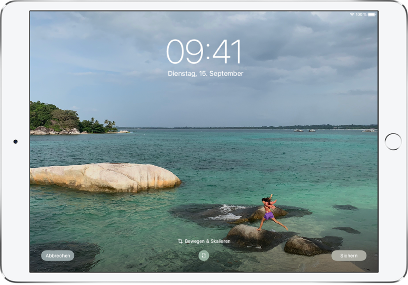 Der Sperrbildschirm des iPad mit einem Foto aus der Fotomediathek als Hintergrundbild.