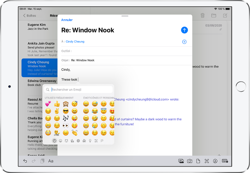 Une réponse par e-mail s’affiche à l’écran. Le clavier Emoji s’affiche au niveau du point d’insertion de texte.