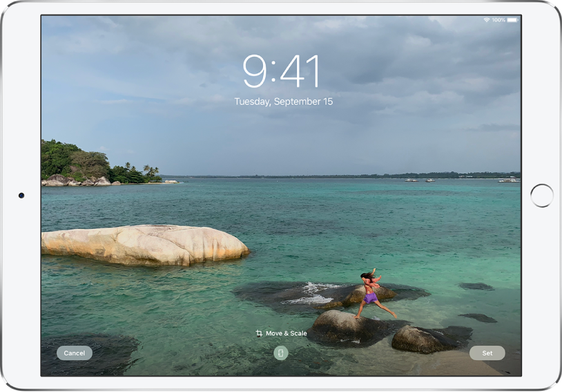 „iPad“ užrakinimo ekranas, kaip fono paveikslėlis nustatyta nuotrauka iš nuotraukų bibliotekos.