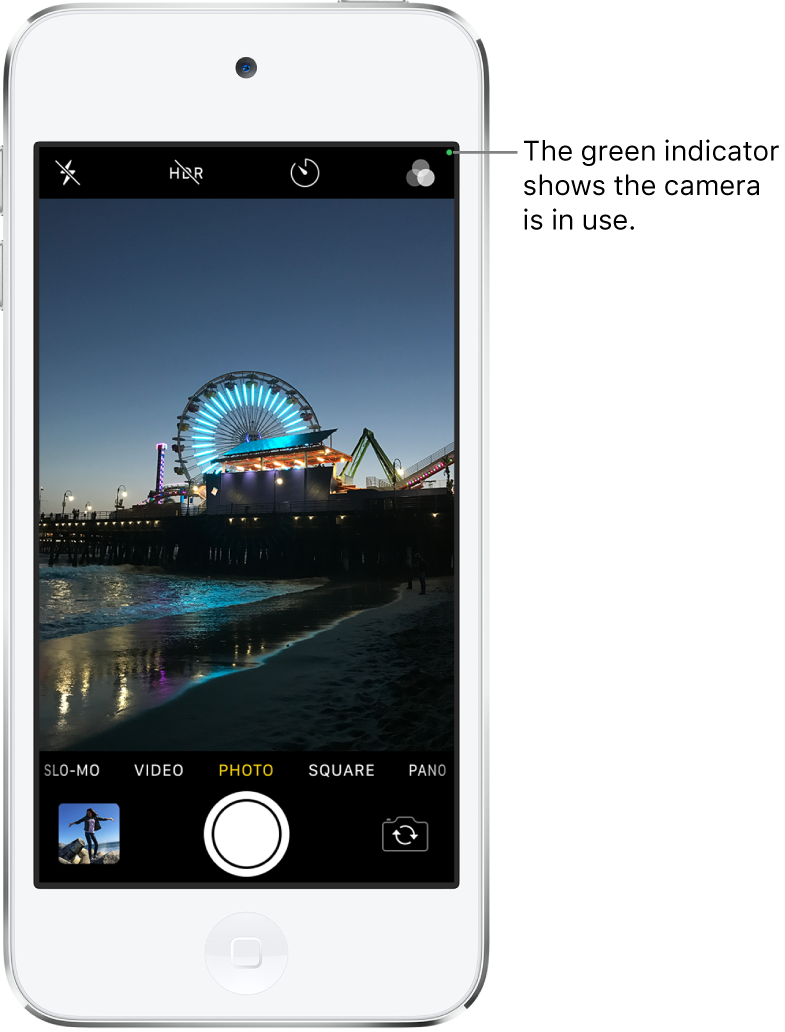 The Camera screen in Photo mode. A green indicator at the top right shows that the camera is in use.