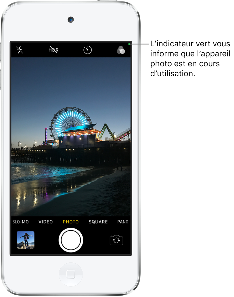 L’écran « Appareil photo » en mode Photo. Un indicateur vert en haut à droite affiche que l’appareil photo est en cours d’utilisation.