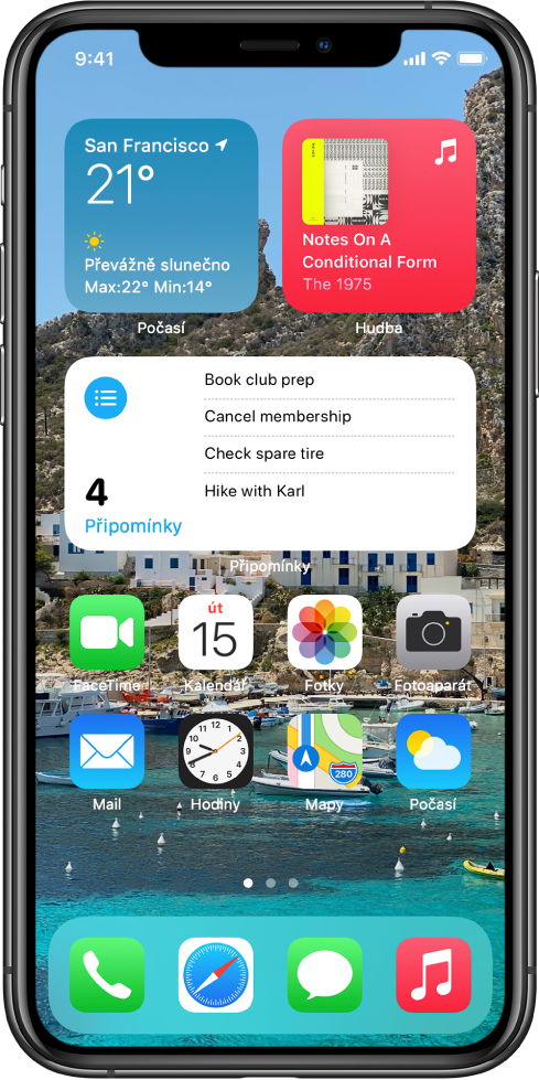 Plocha s přizpůsobeným pozadím, s widgety Mapy a Kalendář a ikonami dalších aplikací
