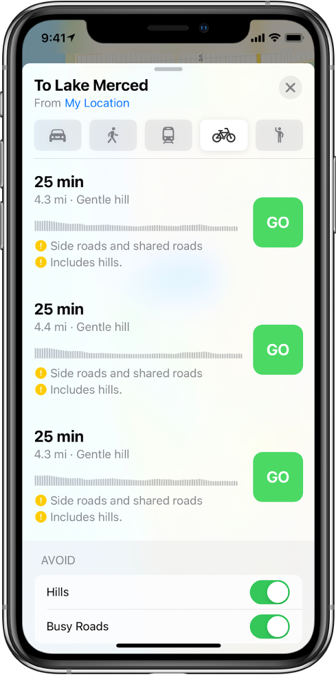 A list of cycling routes. A Go button appears for each route along with information about the route, including its estimated time, elevation changes, and types of roads. Buttons to avoid hills and busy roads appear at the bottom of the screen.