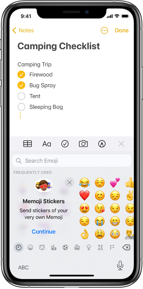 A note in the Notes app being edited, with the emoji keyboard open and the Search Emoji field at the top of the keyboard.