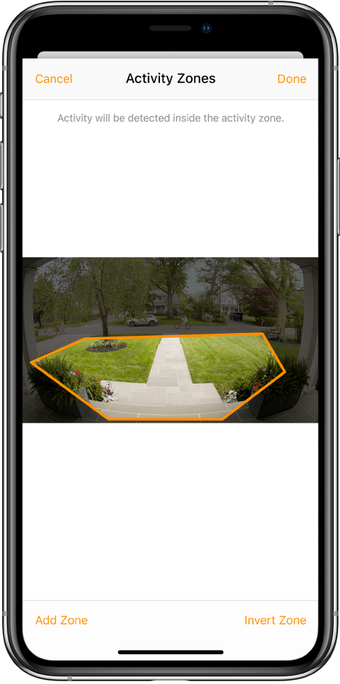 The iPhone screen showing an activity zone within an image taken by a doorbell camera. The activity zone encompasses a front porch and walkway, but excludes the street and driveway. Cancel and Done buttons are above the image. Add Zone and Invert Zone buttons are below.