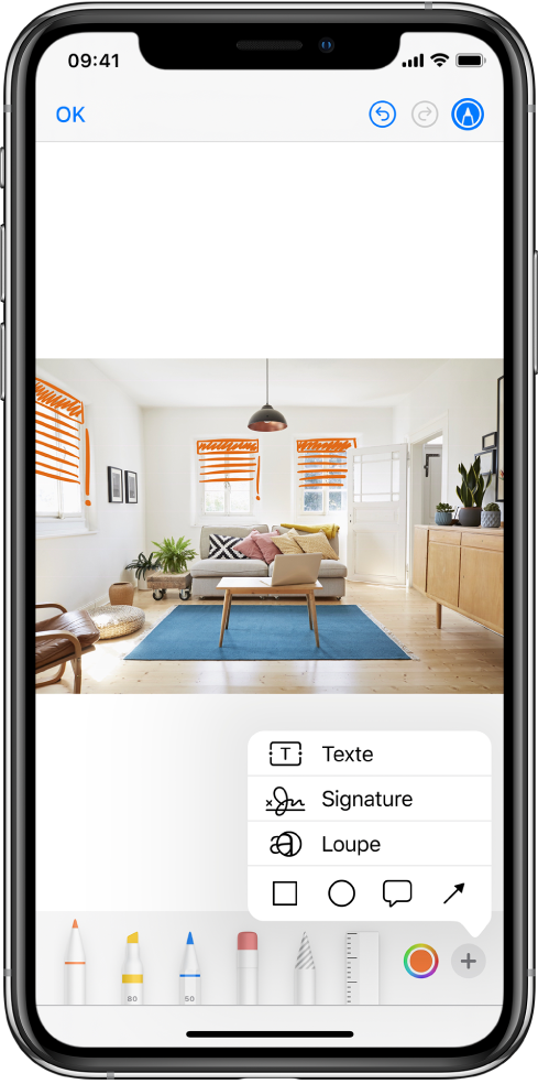 Une photo est annotée avec des lignes orange pour indiquer les stores au-dessus des fenêtres. La barre d’outils d’annotation avec les outils de dessins et le sélecteur de couleurs apparaît en bas de l’écran. Un menu avec des choix pour ajouter du texte, une signature, une loupe et des formes apparaît dans le coin inférieur droit.