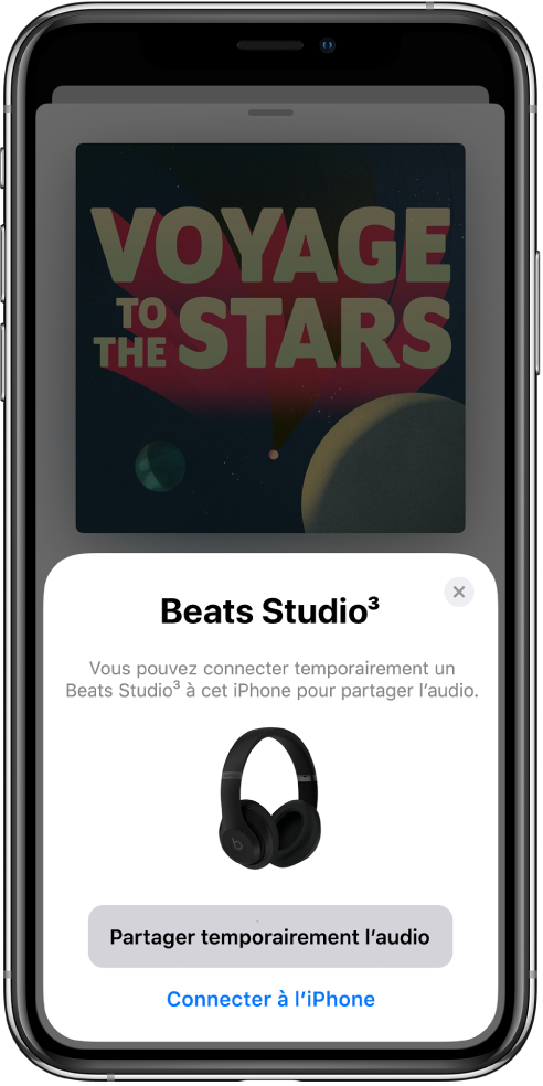 Écran d’iPhone montrant des écouteurs Beats. Vers le bas de l’écran se trouve un bouton permettant de partager temporairement du contenu audio.