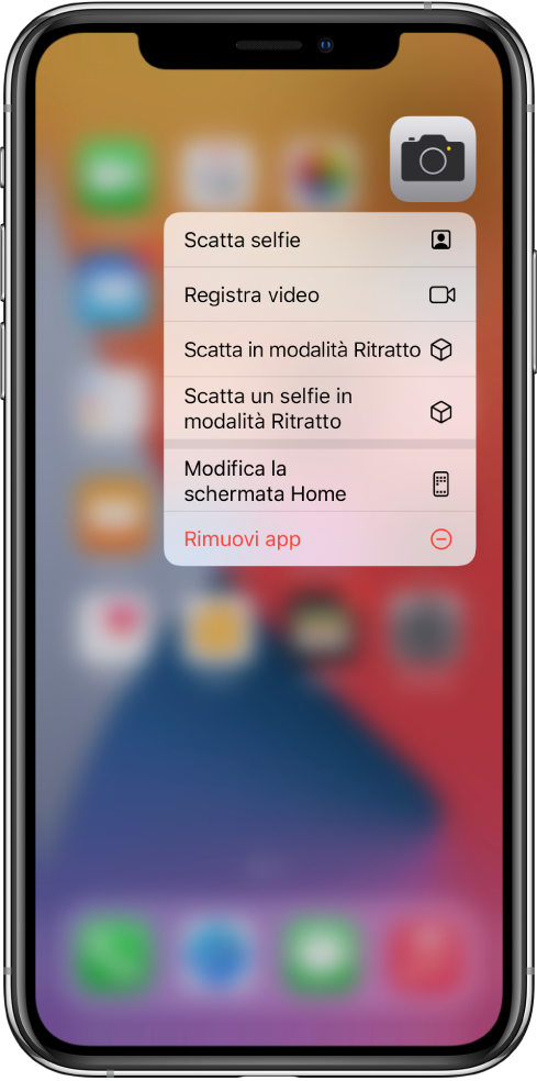 La schermata Home sfocata, con il menu delle azioni rapide della fotocamera visualizzato sotto l'app Fotocamera.