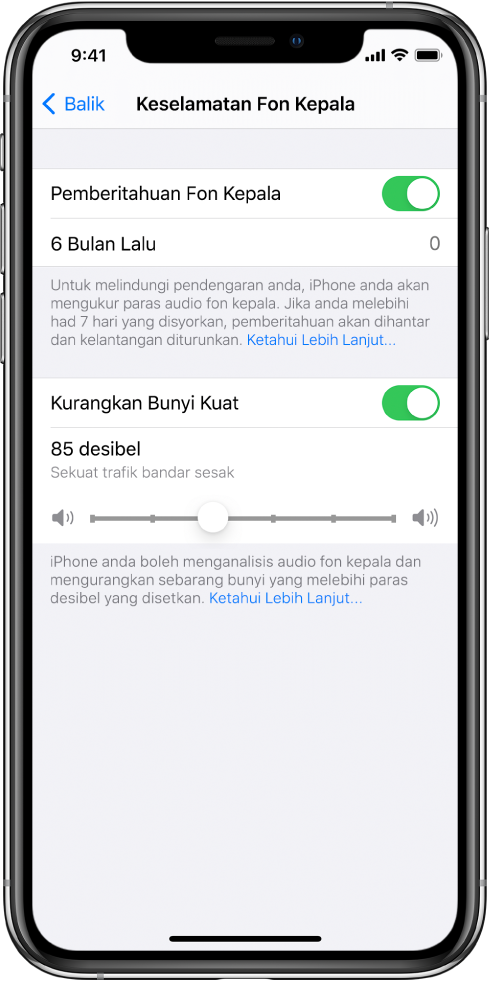 Skrin Keselamatan Fon Kepala, menunjukkan butang untuk mengaktifkan atau menyahaktifkan Pemberitahuan Fon Kepala, bilangan pemberitahuan fon kepala dihantar dalam tempoh 6 bulan sebelumnya, butang untuk mengaktifkan atau menyahaktifkan seting Kurangkan Bunyi Kuat, gelangsar untuk menukarkan paras desibel maksimum dan had desibel dipilih iaitu 85 desibel.