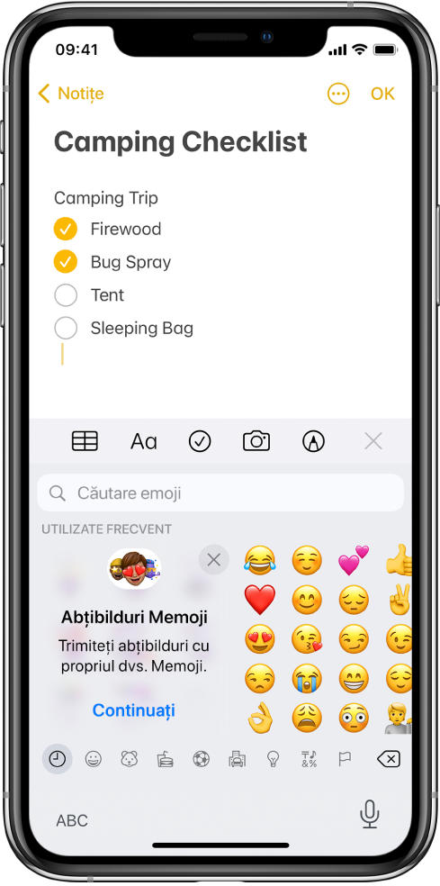 O notiță din aplicația Notițe este editată, având tastatura Emoji deschisă și câmpul de căutare a caracterelor emoji în partea de sus a tastaturii.