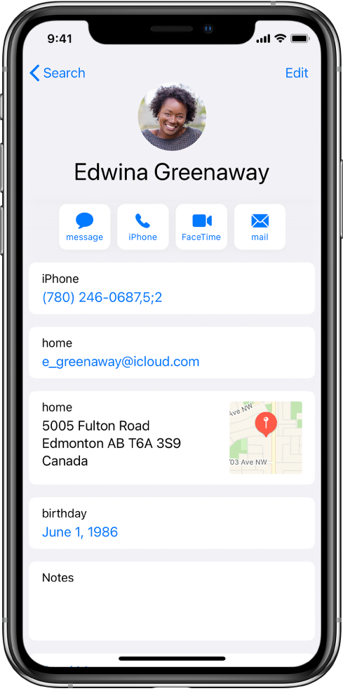 Telefonska številka z vejico, ki označuje dvosekundni premor med števkami, in dvopičjem, ki označuje prenehanje klicanja, dokler ponovno ne tapnete Dial.