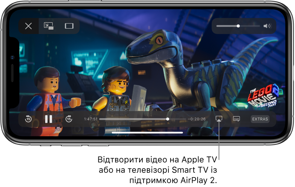 На екрані iPhone відтворюється фільм. Унизу екрана розташовані елементи керування відтворенням, зокрема кнопка «Відеодублювання» внизу справа.