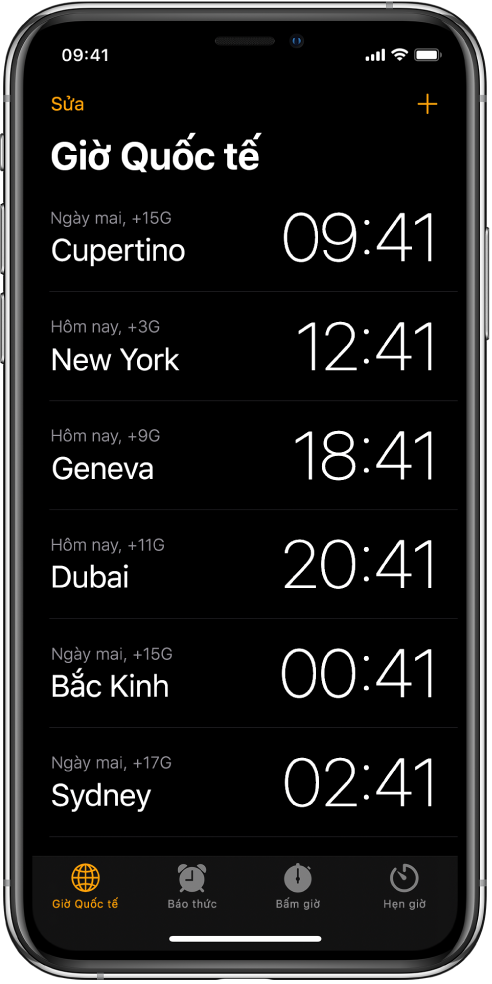 Tab Giờ quốc tế, đang hiển thị thời gian tại nhiều thành phố. Chạm vào Sửa ở góc phía trên bên trái để sắp xếp các đồng hồ. Chạm vào nút Thêm ở phía trên bên phải để thêm đồng hồ khác. Các nút Giờ quốc tế, Báo thức, Bấm giờ và Hẹn giờ nằm ở dưới cùng.