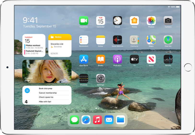 The iPad Home Screen. On the left side of the screen is Today View, showing the Calendar, Notes, Photos, and Reminders widgets. On the right side of the screen are apps.