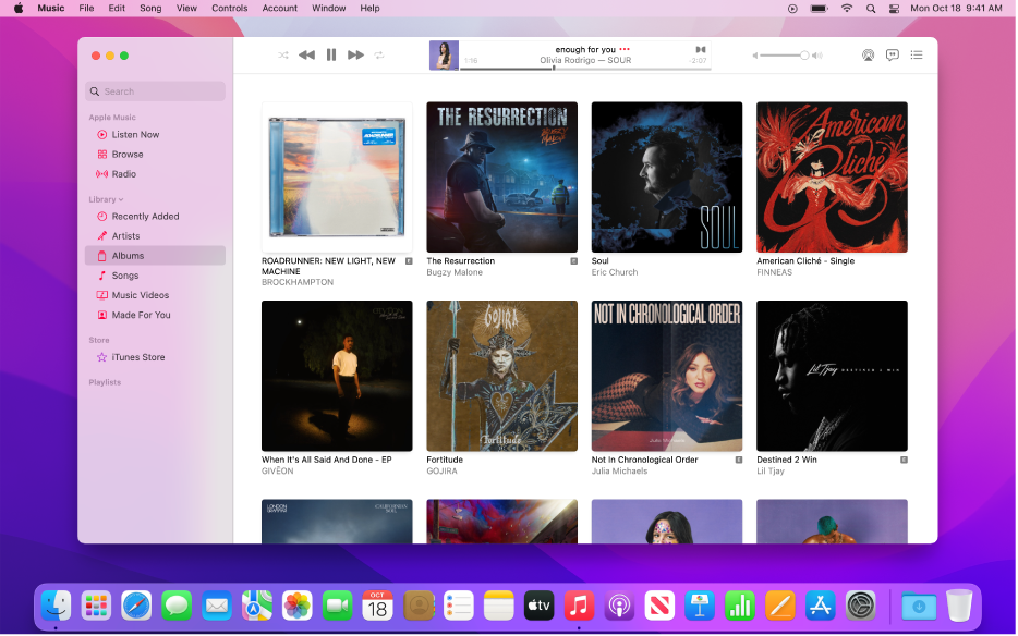 The Apple Music window with a library of multiple albums.