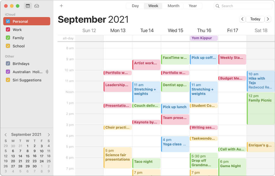 A Calendar window in Month view showing colour-coded personal, work, family and school calendars in the sidebar under the iCloud account heading.