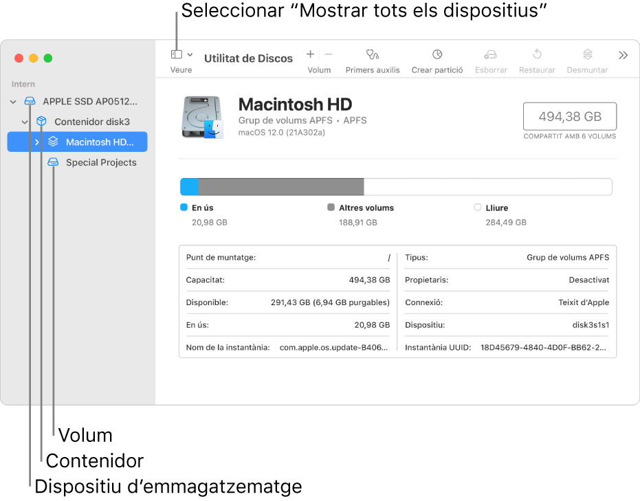 Una finestra de la Utilitat de Discos on es poden veure tres volums, un contenidor i un dispositiu d’emmagatzematge a la vista “Mostrar tots els dispositius”.