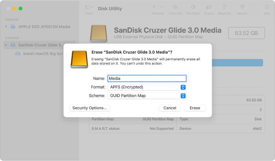 A Disk Utility window showing the erase dialogue being set up to reformat a flash drive with an APFS encrypted format.