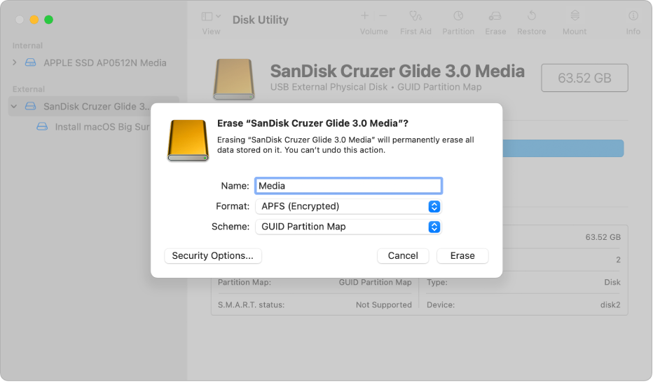 A Disk Utility window showing the erase dialog being set up to reformat a flash drive with an APFS encrypted format.
