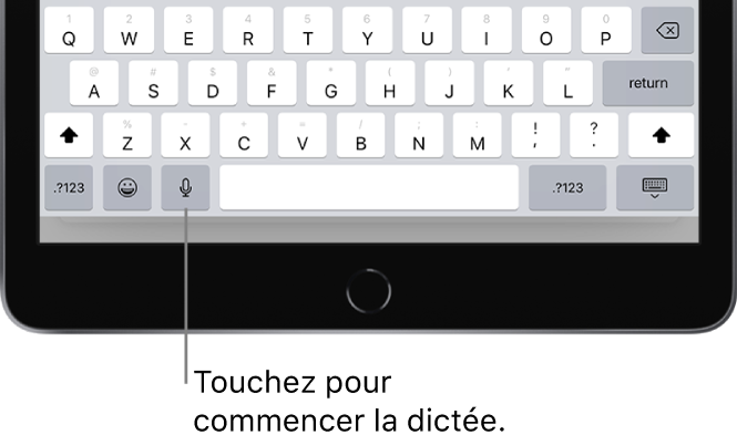 Clavier à l’écran montrant la touche Dicter (à gauche de la barre d’espace), que vous pouvez toucher pour commencer à dicter du texte.