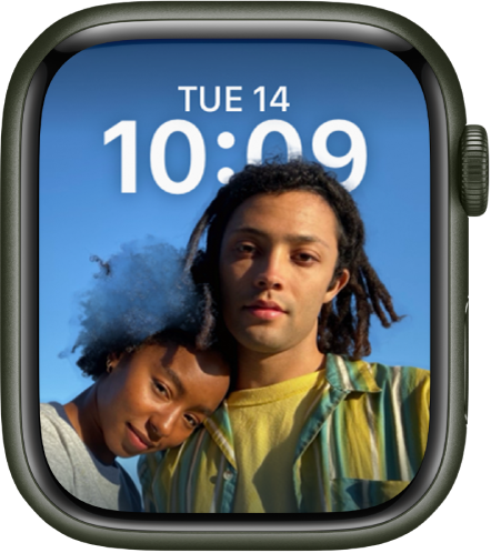 The Portraits watch face shows a photo from your synced photo album. The date and time is at the top.