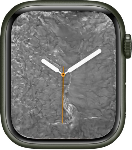 Carátula "Metal líquido" mostrando un reloj análogo en el centro y metal líquido a su alrededor.