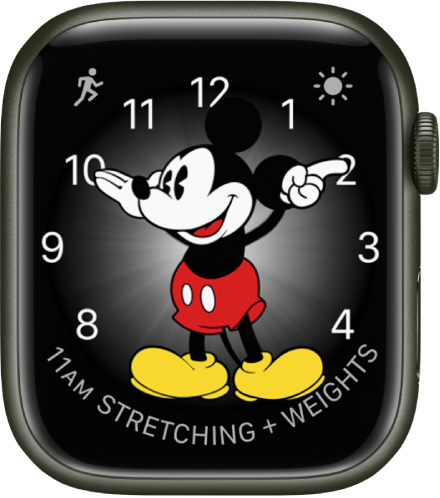 Številčnica z Miki miško, na katero lahko dodate tudi pripomočke. Prikazuje tri pripomočke: Workout (Vadba) levo zgoraj, Weather Conditions (Vremenske razmere) desno zgoraj in Calendar Schedule (Koledar z urnikom) spodaj.