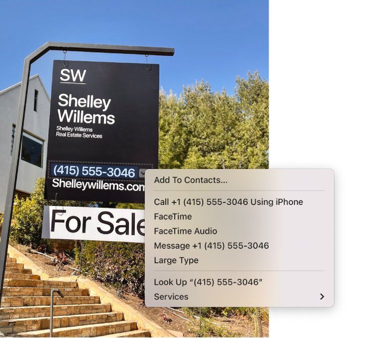 Photo of a For Sale sign showing the estate agent’s phone number selected as Live Text and a menu presenting options to add the phone number to Contacts, call the number, start a FaceTime call, send a text message and more.