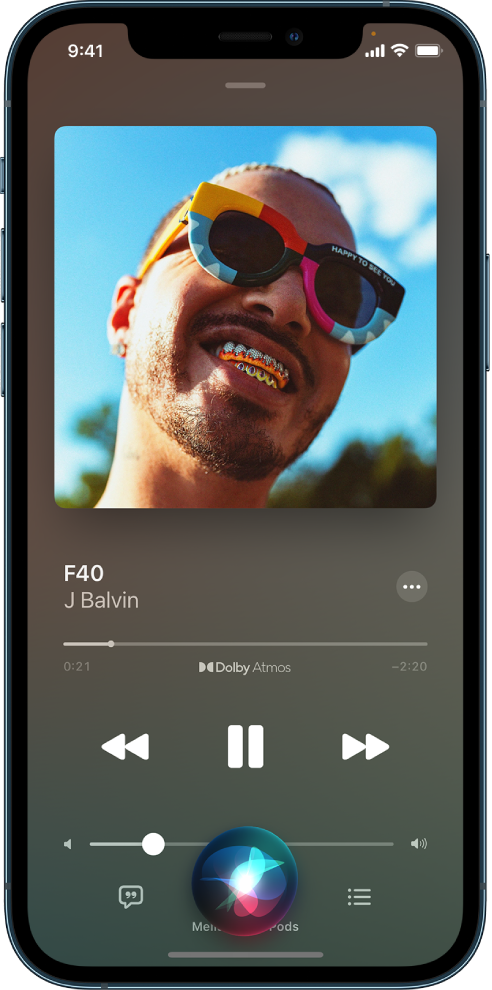 A playback screen in Apple Music. At the bottom of the screen, the Siri icon is active, indicating that Siri is being used for a request.