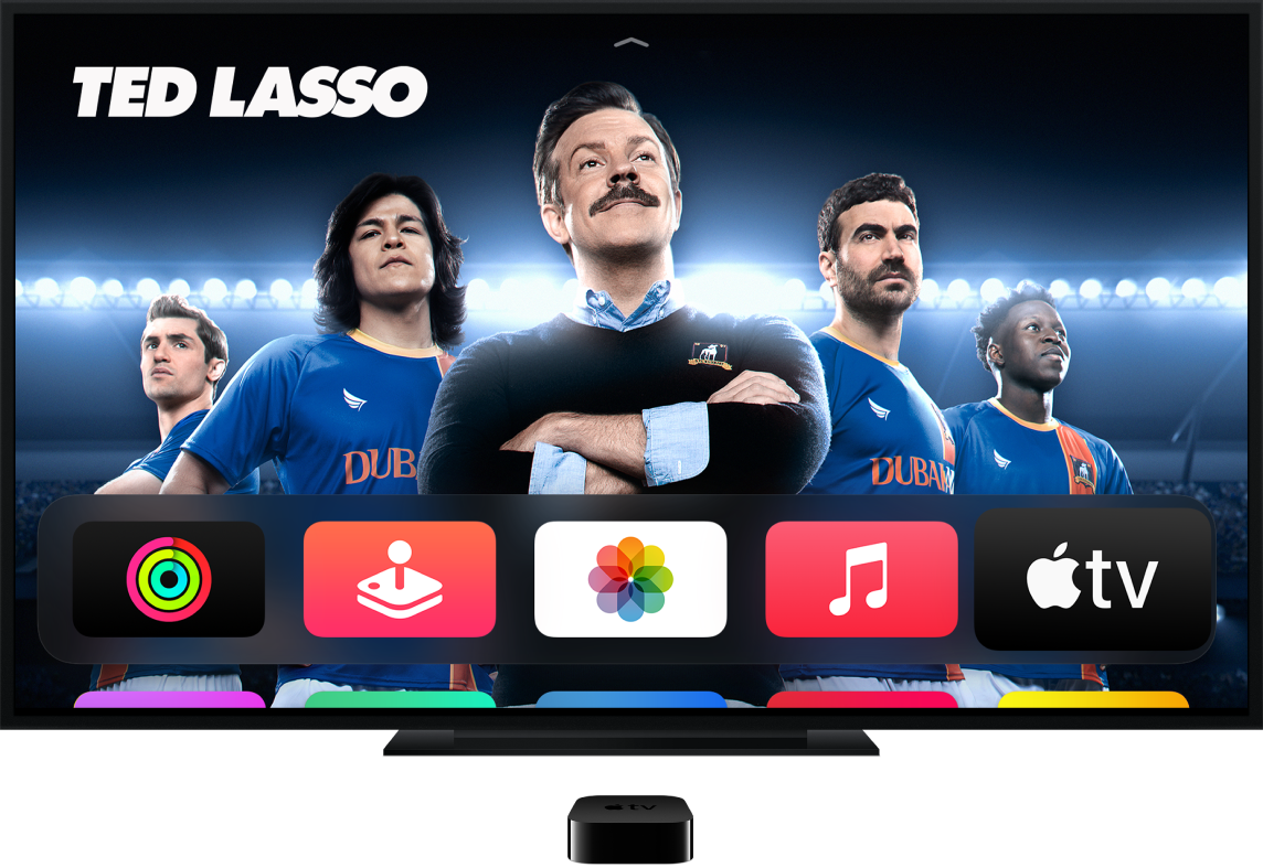 جهاز Apple TV متصل بتلفاز ويعرض الشاشة الرئيسية