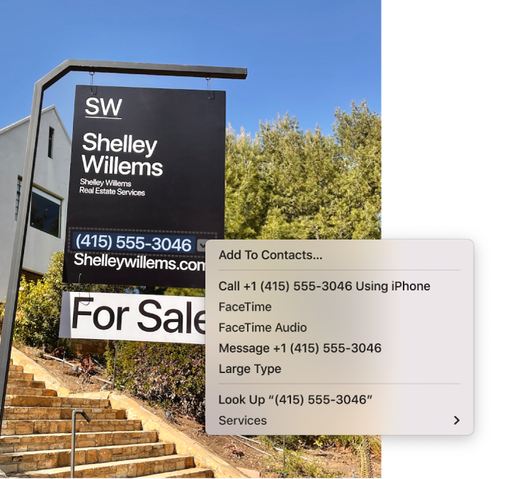 A photo of a Real Estate For Sale sign showing the agent’s phone number selected as Live Text and a menu presenting options to add the phone number to Contacts, call the number, start a FaceTime call, send a text message and more.
