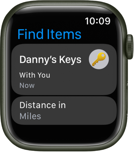 Приложението Find Items (Намери вещи) показва, че закаченият AirTag към връзка с ключове е с вас. Отдолу е бутон Distance in Miles (Разстояние в мили).