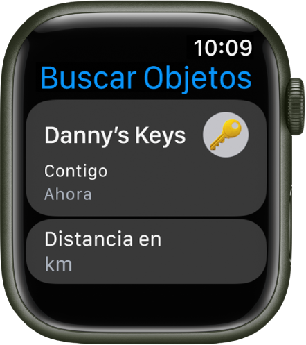 La app Buscar Objetos muestra que el AirTag unido a un juego de llaves está contigo. Debajo aparece el botón “Distancia en km”.