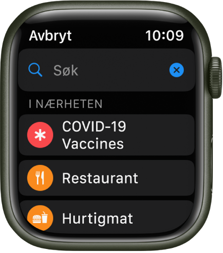 Et søkefelt vises i øvre del av søkeskjermen i Kart-appen. Under Nær deg vises knapper for covid-19-vaksinesentre, restauranter og hurtigmat.