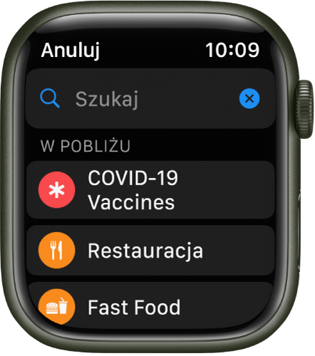 Ekran wyszukiwania w aplikacji Mapy. U góry ekranu widoczne jest pole wyszukiwania. W sekcji W pobliżu widoczne są przyciski punktów szczepień przeciw COVID-19, restauracji i fast foodów.