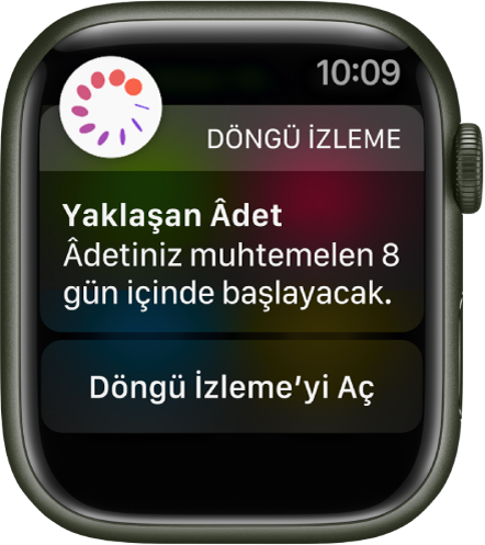 Şu yazının bulunduğu bir döngü tahmini ekranını gösteren Apple Watch: “Yaklaşan Âdet. Âdetiniz muhtemelen 8 gün içinde başlayacak.” Döngü İzleme’yi Aç düğmesi en altta görünür.