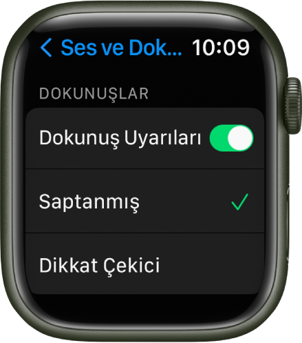 Apple Watch’ta Dokunuş Uyarıları anahtarı ile altında Saptanmış ve Dikkat Çekici seçeneklerinin olduğu Ses ve Dokunuş ayarları.