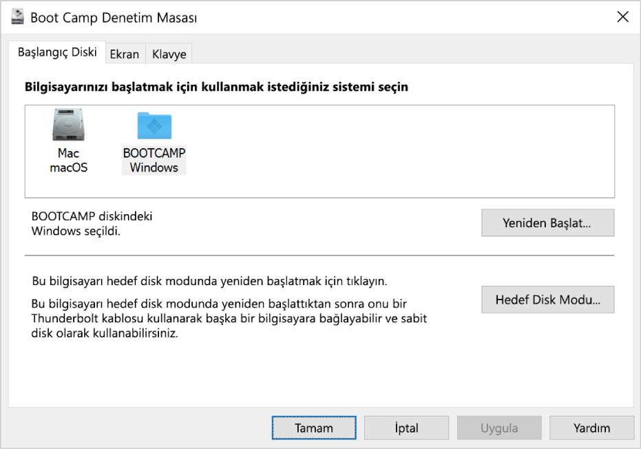 Boot Camp Denetim Masası, bilgisayarınızı yeniden başlatma veya bilgisayarı hedef disk modunda kullanma seçeneklerini de içeren başlangıç diski seçme penceresini gösteriyor.